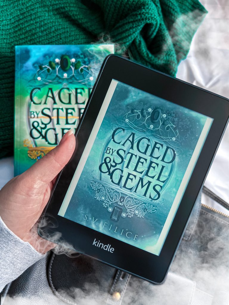 holding a kindle with CBSAG cover